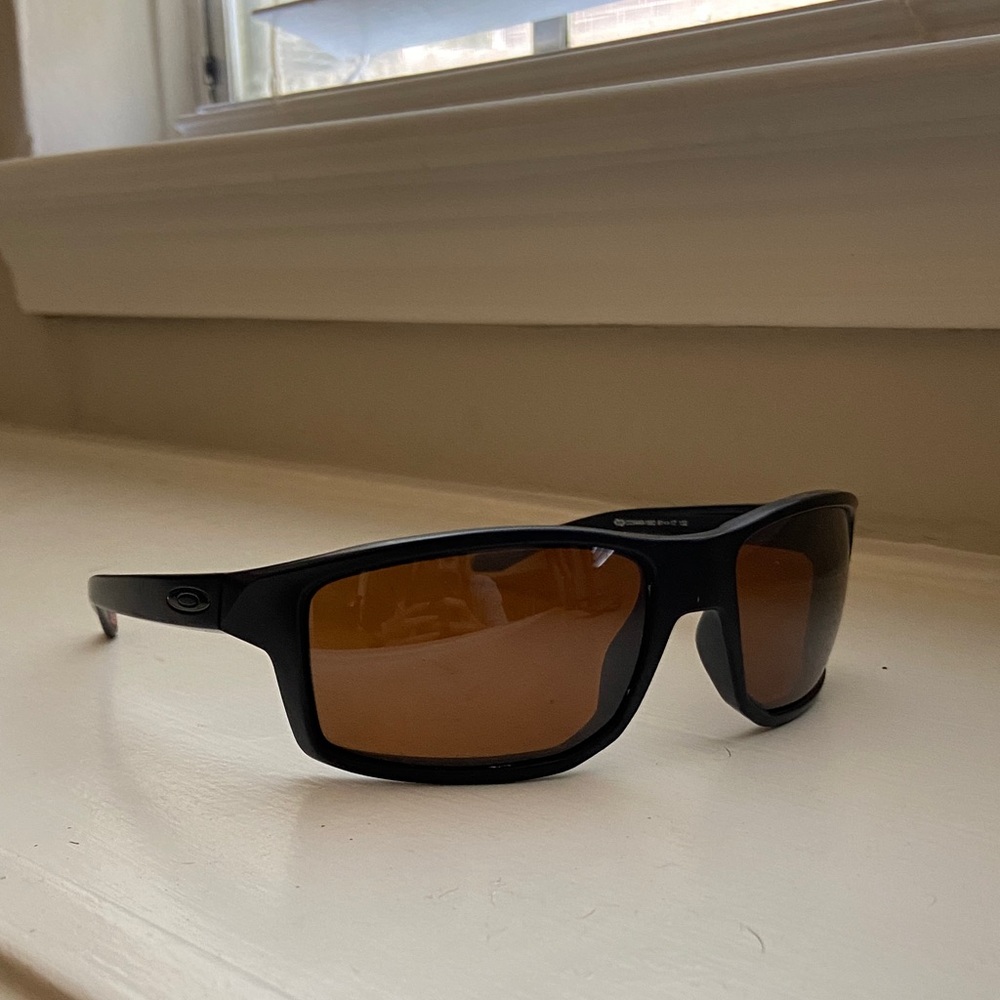 Oakley Black Frame Sunglasses with Brown Tint